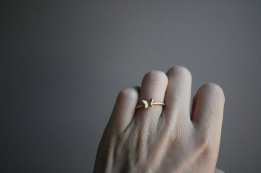 A sweet baby butterfly cast in solid 10k recycled gold. A symbol of new beginnings, new chapters, and new ideas. Stacks beautifully as an everyday gold ring.